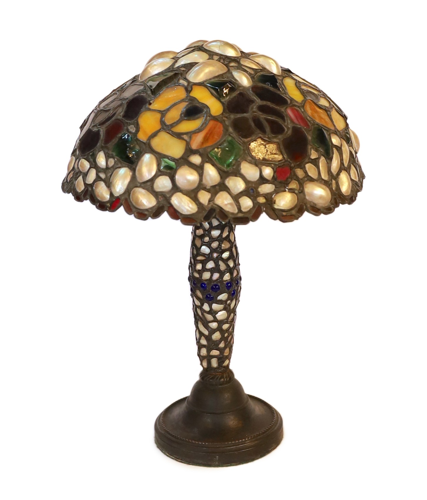 A 1920s Austrian stained glass and mother-of-pearl table lamp with domed shade, height 48cm